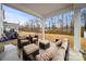 Spacious covered patio area with a full outdoor furniture set, ceiling, and yard at 3899 Center Place Dr, Harrisburg, NC 28075