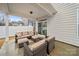 Cozy covered patio features comfortable seating, perfect for relaxing outdoors at 3899 Center Place Dr, Harrisburg, NC 28075