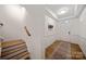 The house has a beautiful entryway with stylish walls and a wooden staircase at 3899 Center Place Dr, Harrisburg, NC 28075
