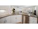 Open concept kitchen featuring modern countertops and stainless steel appliances at 3899 Center Place Dr, Harrisburg, NC 28075