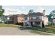 New luxury homes boast beautiful brickwork, covered porches, and professionally landscaped yards at 4008 Nettie Ct # 3, Charlotte, NC 28211