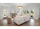 Elegant living room with fireplace, hardwood floors, and plenty of natural light at 4008 Nettie Ct # 3, Charlotte, NC 28211