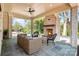 Covered patio featuring a stone fireplace and comfortable seating at 4008 Nettie Ct # 3, Charlotte, NC 28211