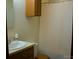 Modest bathroom features single vanity and shower at 522 Perry St, Troy, NC 27371