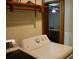 Convenient laundry area with modern washer and dryer set and ample storage options at 522 Perry St, Troy, NC 27371