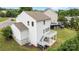 An elevated view shows a two-story home featuring a rear deck with stairs to the backyard at 531 Harlech Ct, Fort Mill, SC 29715