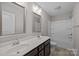 Bright bathroom featuring a double vanity, chrome fixtures and a shower-tub combo at 531 Harlech Ct, Fort Mill, SC 29715