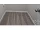 A close up of a bedroom floor with neutral carpet and white trim at 531 Harlech Ct, Fort Mill, SC 29715