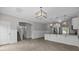 Spacious living room with wood-look flooring, white trim, and an open concept design at 531 Harlech Ct, Fort Mill, SC 29715