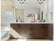 Contemporary bathroom showcasing double vanity, modern lighting, and sleek design at 5520 Chedworth Dr, Charlotte, NC 28210