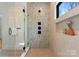 Walk-in shower featuring sleek hardware and window at 5520 Chedworth Dr, Charlotte, NC 28210
