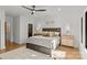 Spacious bedroom featuring hardwood floors, recessed lighting, a ceiling fan, and tasteful decor at 5520 Chedworth Dr, Charlotte, NC 28210