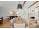 Elegant dining room with modern decor and a view into the living room at 5520 Chedworth Dr, Charlotte, NC 28210