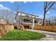 Stunning two-story home featuring a modern design, spacious balconies, and a well-manicured lawn at 5520 Chedworth Dr, Charlotte, NC 28210