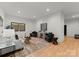 Contemporary living room with modern sofa, textured rug, and stylish decor at 5520 Chedworth Dr, Charlotte, NC 28210