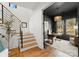 Sophisticated office with dark walls, modern lighting, and a large window, providing an ideal workspace at 5520 Chedworth Dr, Charlotte, NC 28210