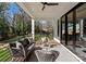 Inviting outdoor patio space featuring comfortable seating and a view of the serene surroundings at 5520 Chedworth Dr, Charlotte, NC 28210