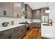 Modern kitchen featuring an island, stainless steel appliances, and ample countertop space at 5610 Farmbrook Dr, Charlotte, NC 28210