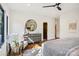 Bright main bedroom with a comfortable seating area and contemporary decor at 5610 Farmbrook Dr, Charlotte, NC 28210