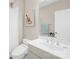 Bathroom features a white sink, toilet with bidet, and a shower with a white curtain at 6022 Candlestick Ln, Lancaster, SC 29720