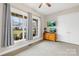 Bedroom featuring large windows, gray curtains, a TV and a dresser at 6022 Candlestick Ln, Lancaster, SC 29720