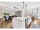 Spacious kitchen with large island, stainless steel appliances, and seamless flow to living area at 6022 Candlestick Ln, Lancaster, SC 29720