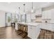 Bright, open kitchen with a view of the eat-in dining area, stainless steel appliances and kitchen island at 6022 Candlestick Ln, Lancaster, SC 29720