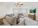 Comfortable living room with plush seating, a ceiling fan, and a TV for relaxing entertainment at 6022 Candlestick Ln, Lancaster, SC 29720