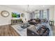Comfortable living room with stylish décor, hardwood floors, and seamless flow to other living spaces at 6022 Candlestick Ln, Lancaster, SC 29720