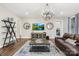 Inviting living room with stylish decor, hardwood floors, and seamless flow to other living spaces at 6022 Candlestick Ln, Lancaster, SC 29720
