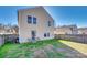 Spacious backyard featuring a patio, lawn area, and privacy fence, perfect for outdoor entertaining at 6523 Matlea Ct, Charlotte, NC 28215