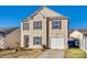 Charming two-story home with a well-maintained lawn, attached garage, and a welcoming front entrance at 6523 Matlea Ct, Charlotte, NC 28215