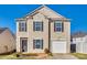 Charming two-story home with a single car garage, complemented by black shutters and manicured landscaping at 6523 Matlea Ct, Charlotte, NC 28215