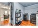 This laundry area includes a washer, dryer, and shelving units, offering a practical and organized space for laundry tasks at 6523 Matlea Ct, Charlotte, NC 28215