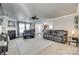 Cozy living room featuring a fireplace, comfortable seating, and an open layout to the kitchen at 6523 Matlea Ct, Charlotte, NC 28215