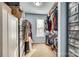 Well-organized walk-in closet featuring custom shelving and ample storage space for clothing and accessories at 6523 Matlea Ct, Charlotte, NC 28215