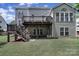 Expansive backyard features a wooden deck and lush green lawn, perfect for outdoor enjoyment at 705 Drew Ave, Fort Mill, SC 29708