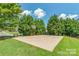 Outdoor basketball court with trees and a bench, offering a recreational space for residents at 705 Drew Ave, Fort Mill, SC 29708
