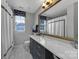 Bathroom with an extra large mirror, tile floors and lots of natural light at 705 Drew Ave, Fort Mill, SC 29708