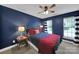 Cozy bedroom featuring a ceiling fan, carpet flooring and matching linens at 705 Drew Ave, Fort Mill, SC 29708