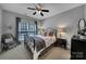 Cozy bedroom with neutral tones, soft lighting, and comfortable furnishings for a relaxing space at 705 Drew Ave, Fort Mill, SC 29708