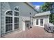 Multi-level deck with a grill and wooded views, perfect for outdoor entertaining at 705 Drew Ave, Fort Mill, SC 29708