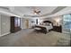 Spacious main bedroom featuring trey ceiling, sitting area and carpet at 705 Drew Ave, Fort Mill, SC 29708