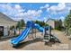 Community playground with a bright blue slide and climbing structure, perfect for entertainment at 705 Drew Ave, Fort Mill, SC 29708