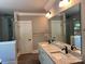 Bathroom showcasing double vanity sinks and a marble tile shower at 7221 Static Way # 13, Sherrills Ford, NC 28673