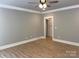 Bedroom featuring hardwood floors, neutral paint, and ceiling fan at 7221 Static Way # 13, Sherrills Ford, NC 28673