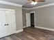 Bedroom featuring two closets, neutral paint, hardwood floors and ceiling fan at 7221 Static Way # 13, Sherrills Ford, NC 28673