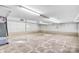 Spacious unfinished basement with concrete floor, white-painted walls, exposed ceiling, and overhead fluorescent lighting at 7270 Long Island Rd, Catawba, NC 28609