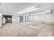 Large unfinished basement space, ready for customization, featuring concrete floor, hot water tank and white walls at 7270 Long Island Rd, Catawba, NC 28609