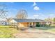 Charming ranch-style home with an attached carport and storage shed, perfect for comfort and practicality at 7270 Long Island Rd, Catawba, NC 28609